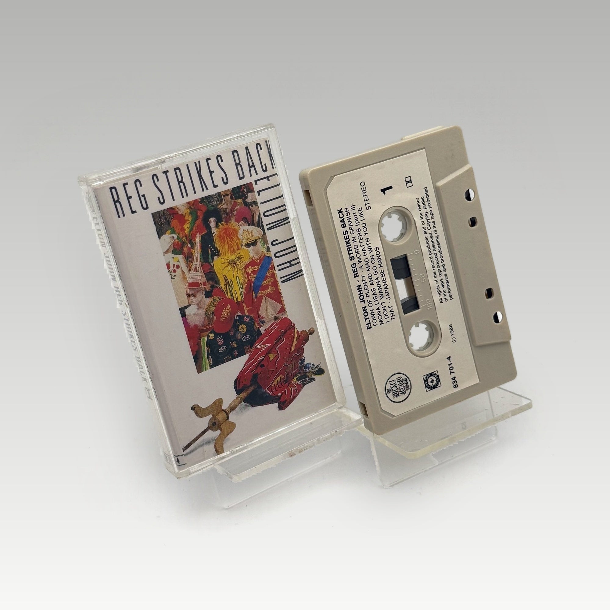 Elton John - Reg Strikes Back • CIB - Image 1