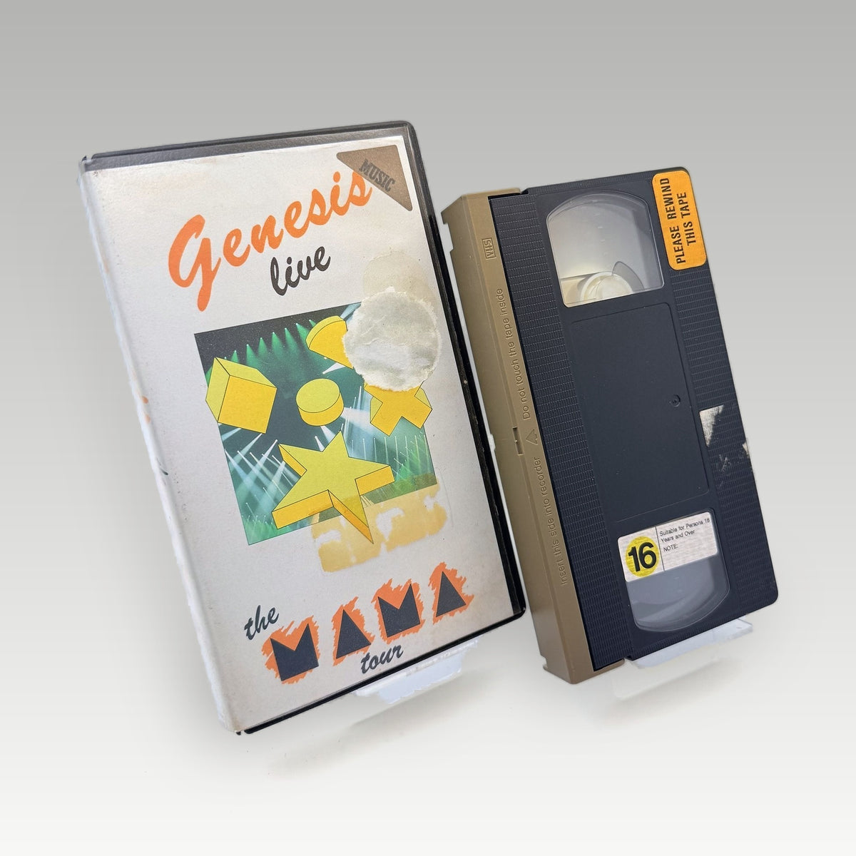 Genesis | Live: The MAMA Tour - National Exhibition Centre, Birmingham (1984) • CIB • Ex-Rental (PAL) - Front Cover | Yappa NZ
