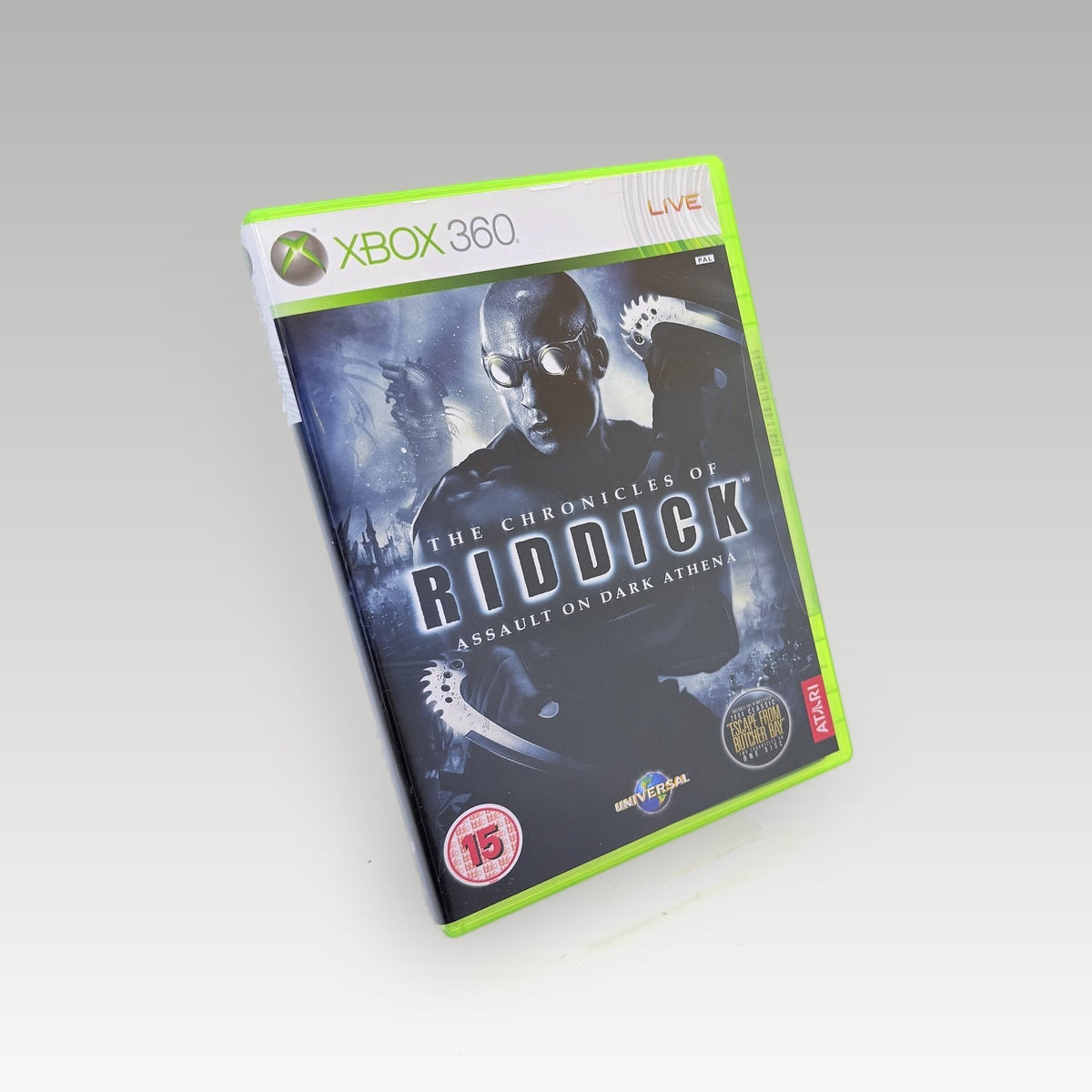The Chronicles of Riddick: Assault on Dark Athena • CIB • New / Sealed (PAL) - Front Cover | Yappa NZ