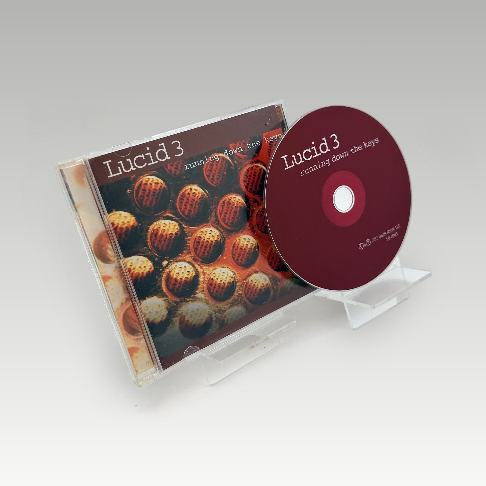 Lucid 3 - Running Down The Keys • CIB - Image 1